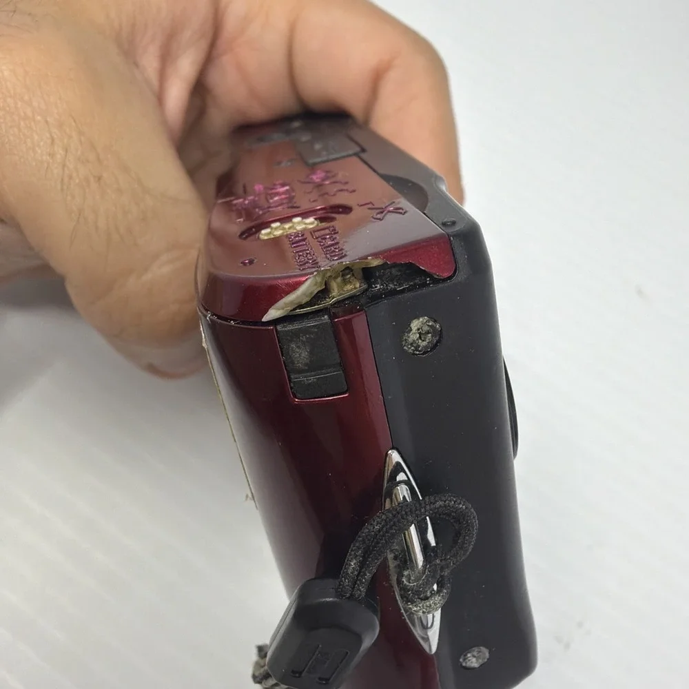 Nikon Coolpix L24 Digital Camera – Red – Battery Cover Faulty – READ***
